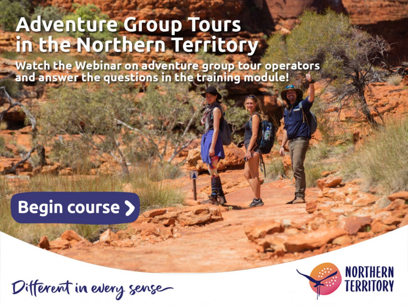 A group of people hiking in the NT Outback