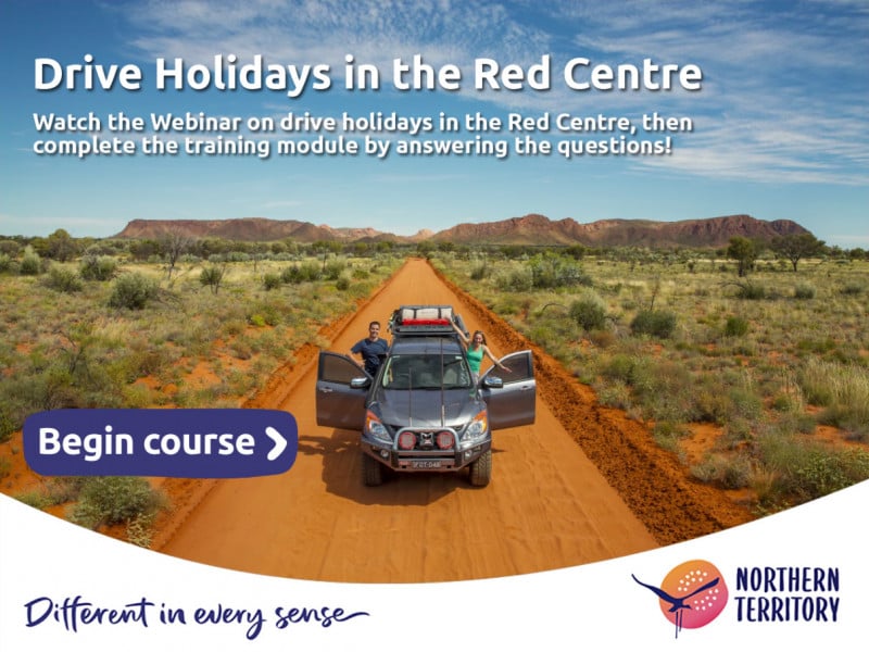 4wd parked on a very long dirt road in the Australian Red Centre